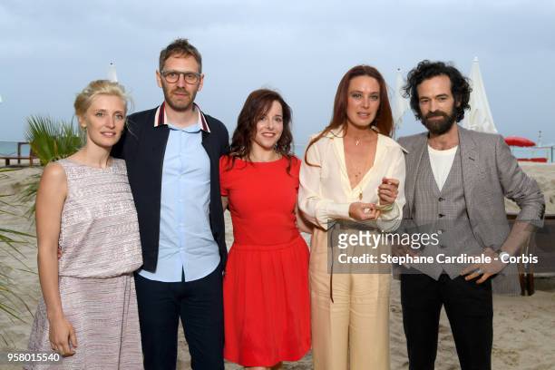 Actor Romain Duris and director Guillaume Senez pose with actresses Lucie Debay , Laure Calamy and Laetitia Dosch at the photocall for "Nos...