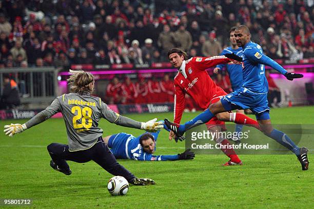 Mario Gomez of Bayern misses a goal against Timo Hildebrand and Marvin Compper of Hoffenheim during the Bundesliga match between Bayern Muenchen and...