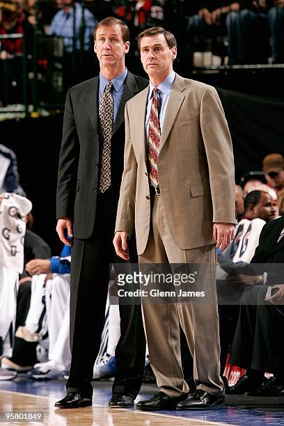 Assistant coach Terry Stotts and head coach Rick Carlisle of the Dallas Mavericks stand on the side line during the game against the Portland Trail...