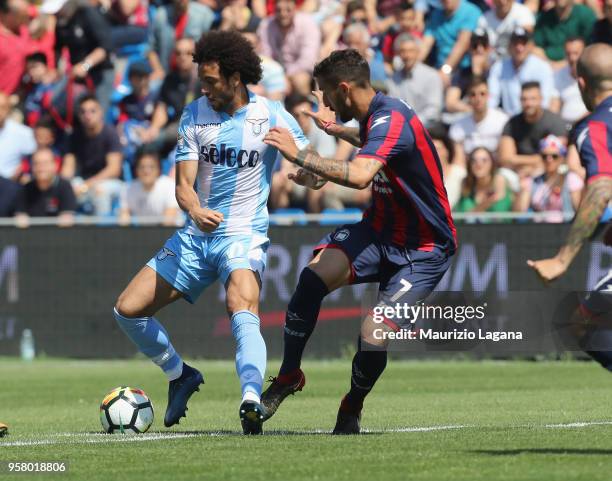 Federico Ceccherini of Crotone competes for the ball with Felipe Anderson of Lazio during the serie A match between FC Crotone and SS Lazio at Stadio...