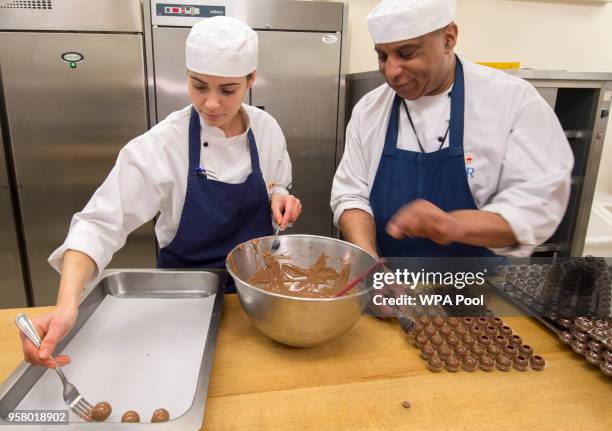 Royal Palaces Pastry chef Selwyn Stoby and chef de pastie Victoria Scupham begin preparations for the wedding banquet for the marriage ceremony of...