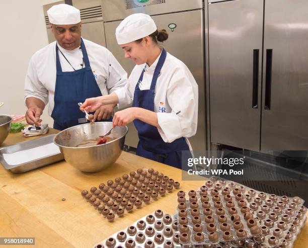 Royal Palaces Pastry chef Selwyn Stoby and chef de pastie Victoria Scupham begin preparations for the wedding banquet for the marriage ceremony of...