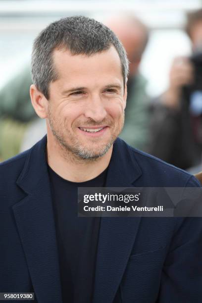 Actor Guillaume Canet attends the photocall for the "Sink Or Swim " during the 71st annual Cannes Film Festival at Palais des Festivals on May 13,...