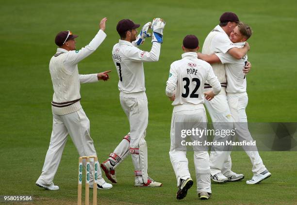 Sam Curran of Surrey celebrates with his teammates after dismissing Tim Bresnan of Yorkshire during day three of the Specsavers County Championship...