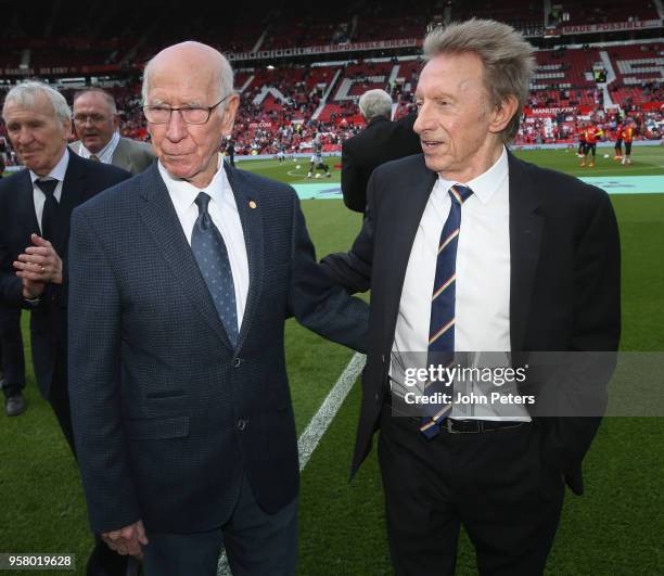 Sir Bobby Charlton and Denis Law meet ahead of the Premier League match between Manchester United and Watford at Old Trafford on May 13, 2018 in...