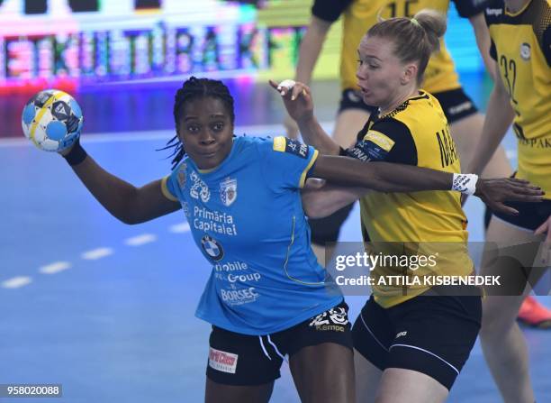 Gnonsiane Niombla of CSM Bucuresti vies with Kseniya Makeeva of Russian Rostov-Don during the bronze match of the EHF Women's Champions League Final...