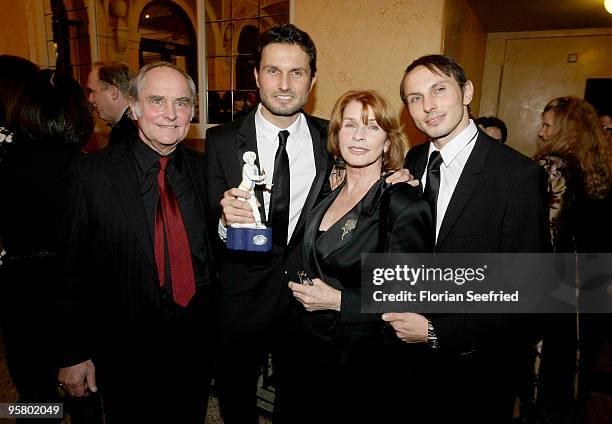 Director Michael Verhoeven and son, director Simon Verhoeven and mother, actress Senta Berger and son Luca Verhoeven attend the afterparty of the...