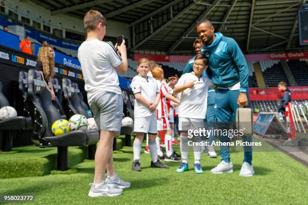 Jordan Ayew of Swansea City arrives prior to the game during the Premier League match between Swansea City and Stoke City at The Liberty Stadium on...