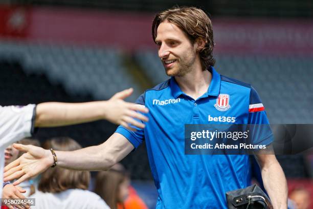 Joe Allen of Stoke City arrives prior to the game during the Premier League match between Swansea City and Stoke City at The Liberty Stadium on May...