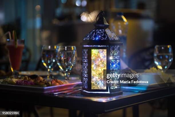 fanoos at iftar table - lantern ramadan stock pictures, royalty-free photos & images