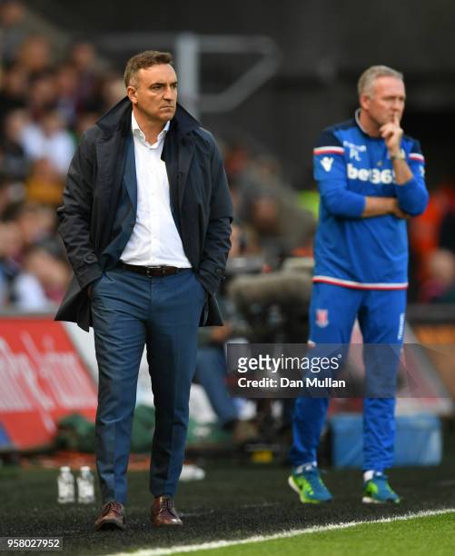 Carlos Carvalhal, Manager of Swansea City and Paul Lambert, Manager of Stoke City looks on during the Premier League match between Swansea City and...