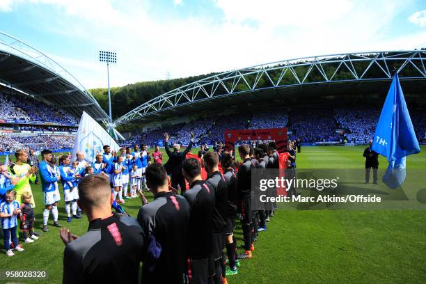 Guard of honour for Arsene Wenger manager of Arsenal as he walks out at John Smith's Stadium before taking his final game in charge during the...