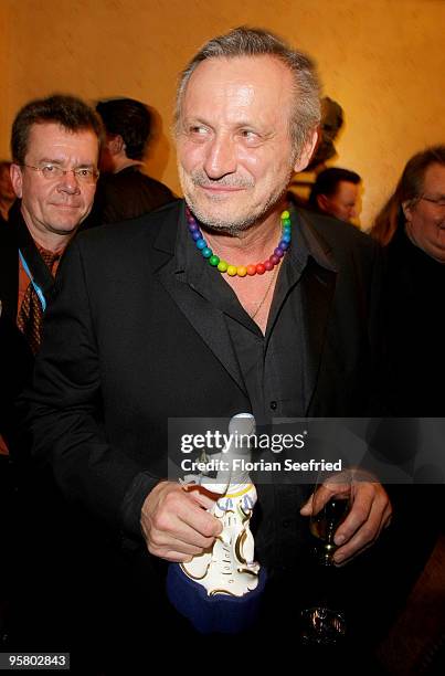 Singer Konstantin Wecker poses with award at the afterparty of the Bavarian Movie Award 2010 at the Prinzregententheater on January 15, 2010 in...