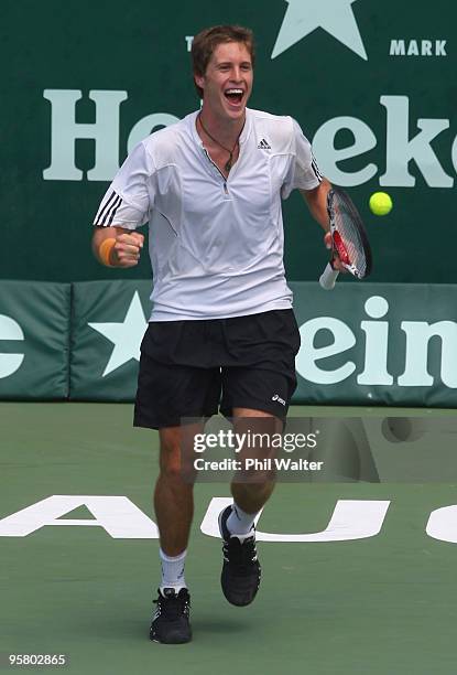 Marcus Daniell of New Zealand celebrates after his doubles final win with partner Horia Tecau of Romania against Marcelo Melo and Bruno Soares of...