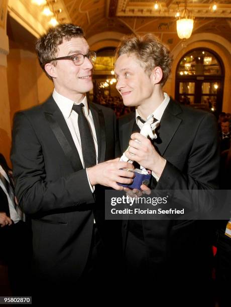 Actor Friedrich Muecke and Matthias Schweighoefer poses with award at the afterparty of the Bavarian Movie Award 2010 at the Prinzregententheater on...