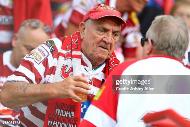 Wigan Warriors fan chats during round six of the Ladbrokes Challenge Cup at KCOM Craven Park on May 13, 2018 in Hull, England.