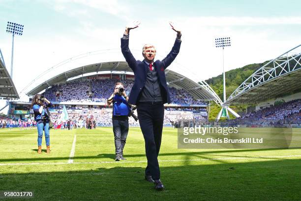 Arsenal manager Arsene Wenger waves to the supporters ahead of the Premier League match between Huddersfield Town and Arsenal at John Smith's Stadium...