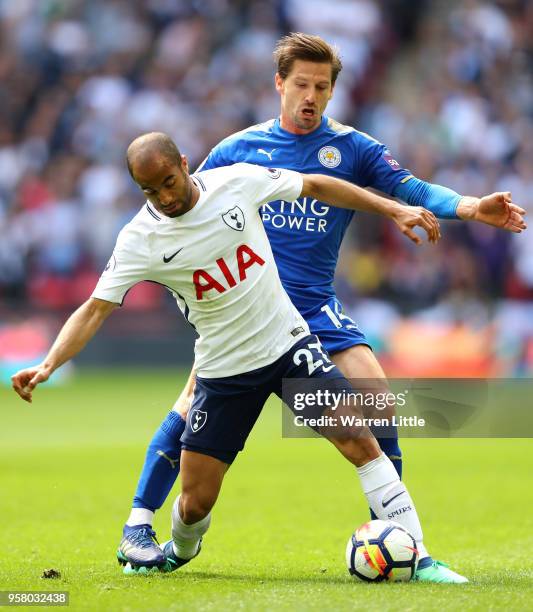 Lucas Moura of Tottenham Hotspur battles for possession with Adrien Silva of Leicester City during the Premier League match between Tottenham Hotspur...