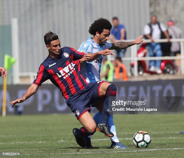 Rolando Mandragora of Crotone competes for the ball with Felipe Anderson of Lazio during the serie A match between FC Crotone and SS Lazio at Stadio...