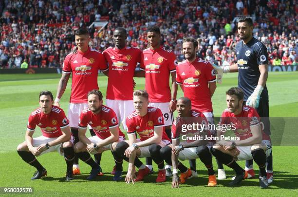 The Manchester United team line up ahead of the Premier League match between Manchester United and Watford at Old Trafford on May 13, 2018 in...