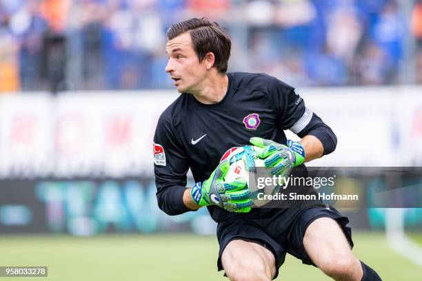 Goalkeeper Martin Maennelaa makes a save during the Second Bundesliga match between SV Darmstadt 98 and FC Erzgebirge Aue at Jonathan-Heimes-Stadion...