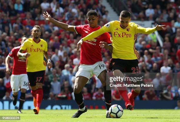 Marcus Rashford of Manchester United in action with Jose Holebas of Watford during the Premier League match between Manchester United and Watford at...