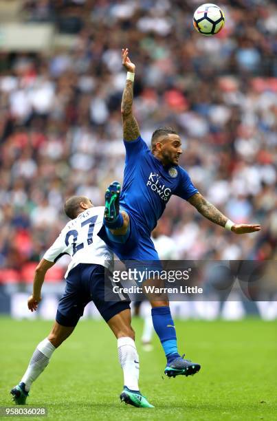 Lucas Moura of Tottenham Hotspur battles for possession with Danny Simpson of Leiceter City during the Premier League match between Tottenham Hotspur...