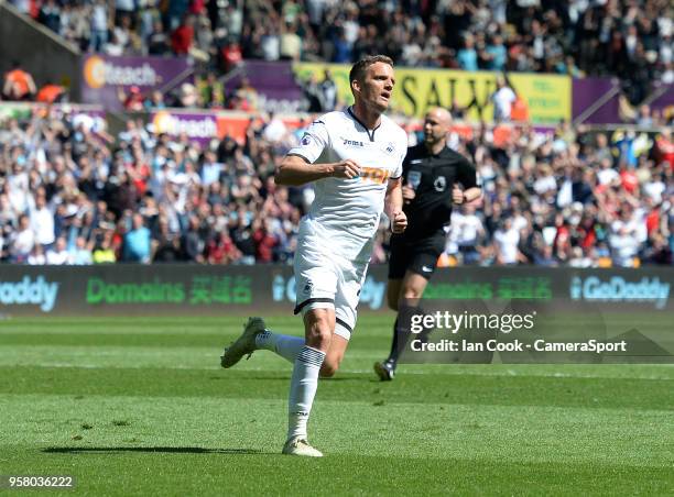 Swansea City's Andy King celebrates scoring his side's first goal during the Premier League match between Swansea City and Stoke City at Liberty...