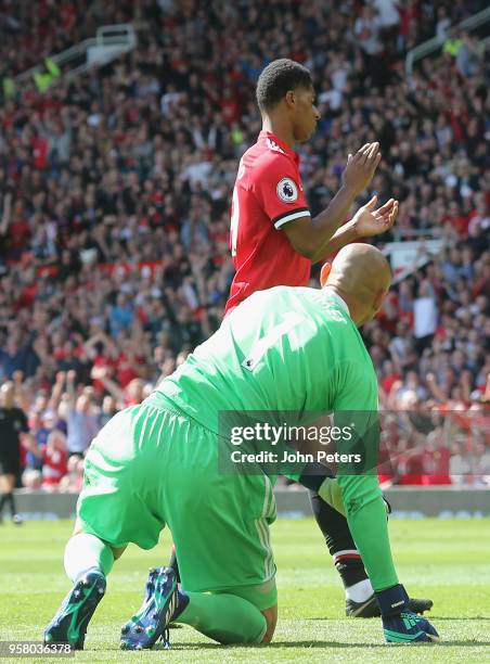 Marcus Rashford of Manchester United celebrates scoring their first goal during the Premier League match between Manchester United and Watford at Old...