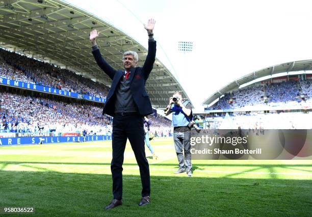 Arsene Wenger, Manager of Arsenal shows appreciation to the fans prior to the Premier League match between Huddersfield Town and Arsenal at John...