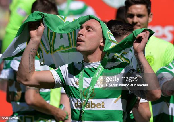 Scott Brown of Celtic celebrates as Celtic win the Ladbrokes Scottish Premier League during the Scottish Premier League match between Celtic and...