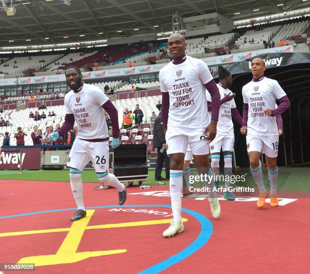 Arthur Masuaku and Angelo Ogbonna of West Ham United come out for warm up prior to Premier League match between West Ham United and Everton at London...