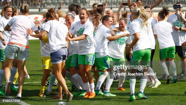 The Team of Wolfsburg celebrate after the Allianz Frauen Bundesliga match between VfL Wolfsburg and SGS Essen at AOK-Stadion on May 13, 2018 in...