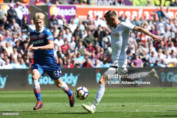 Andy King of Swansea City scores his sides first goal of the game during the Premier League match between Swansea City and Stoke City at Liberty...