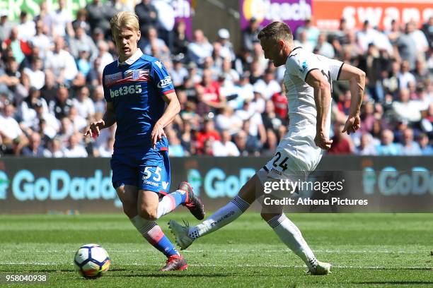 Andy King of Swansea City scores his sides first goal of the game during the Premier League match between Swansea City and Stoke City at Liberty...