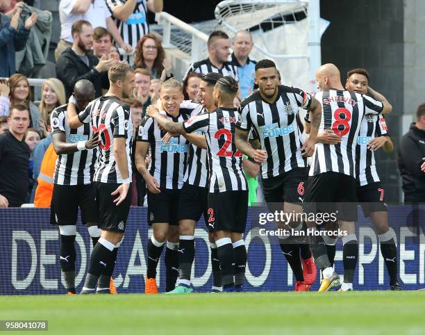 Dwight Gayle of Newcastle celebrates scoring the opening goal during the Premier League match between Newcastle United and Chelsea at St. James Park...