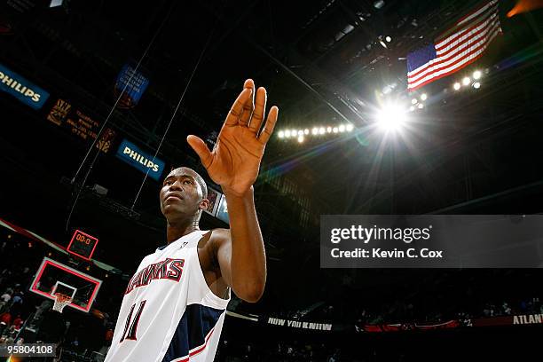 Jamal Crawford of the Atlanta Hawks celebrates after hitting a game-winning three-point basket against the Phoenix Suns at Philips Arena on January...