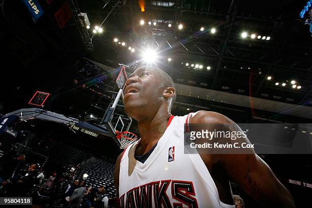 Jamal Crawford of the Atlanta Hawks celebrates after hitting a game-winning three-point basket against the Phoenix Suns at Philips Arena on January...