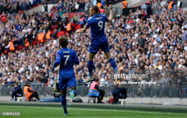 Jamie Vardy of Leicester City celebrates scoring his sides first goal with team mate Demarai Gray of Leicester City during the Premier League match...