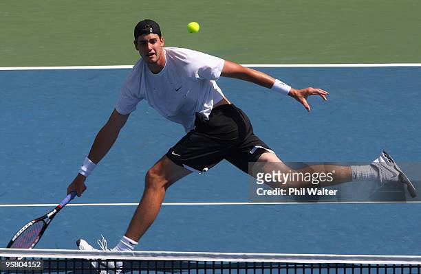 John Isner of the USA volleys at the net in his final match against Arnaud Clement of France during day six of the Heineken Open at the ASB Tennis...