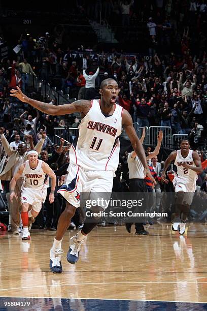 Jamal Crawford of the Atlanta Hawks celebrates after hitting the game-winning 3 pointer against the Phoenix Suns on January 15, 2010 at Philips Arena...