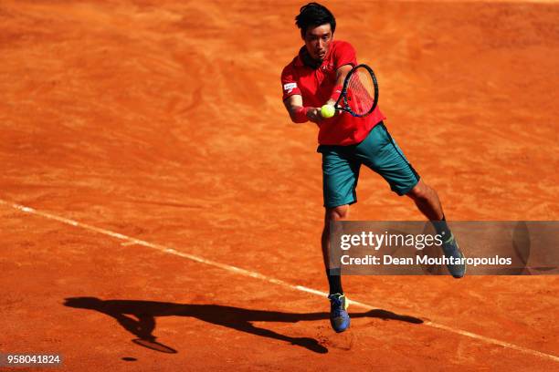 Yuichi Sugita of Japan returns a backhand in his match against Ryan Harrison of the USA during day one of the Internazionali BNL d'Italia 2018 tennis...