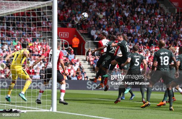 Wesley Hoedt of Southampton heads against the bar during the Premier League match between Southampton and Manchester City at St Mary's Stadium on May...