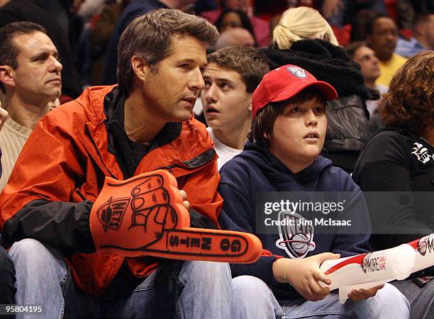 David Goldman and his son Sean attend an NBA game between the New Jersey Nets and the Indiana Pacers at the Izod Center on January 15, 2010 in East...