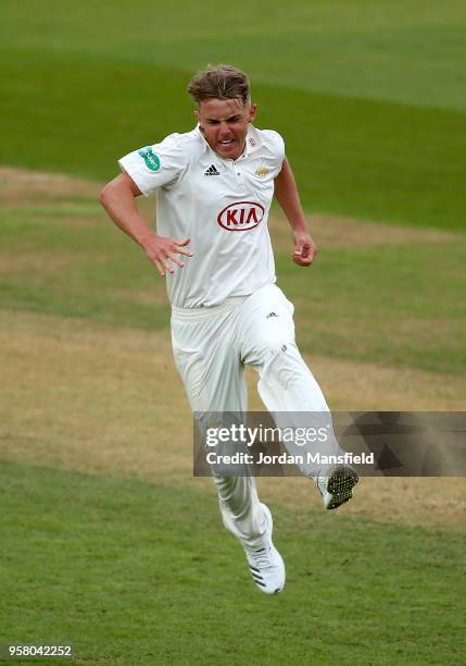 Sam Curran of Surrey celebrates dismissing Cheteshwar Pujara of Yorkshire during day three of the Specsavers County Championship Division One match...