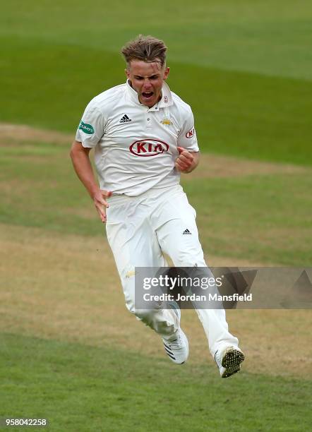 Sam Curran of Surrey celebrates dismissing Cheteshwar Pujara of Yorkshire during day three of the Specsavers County Championship Division One match...