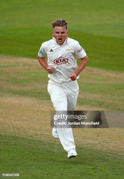 Sam Curran of Surrey celebrates dismissing Cheteshwar Pujara of Yorkshire during day three of the Specsavers County Championship Division One match...