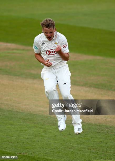 Sam Curran of Surrey celebrates dismissing Cheteshwar Pujara of Yorkshire during day three of the Specsavers County Championship Division One match...