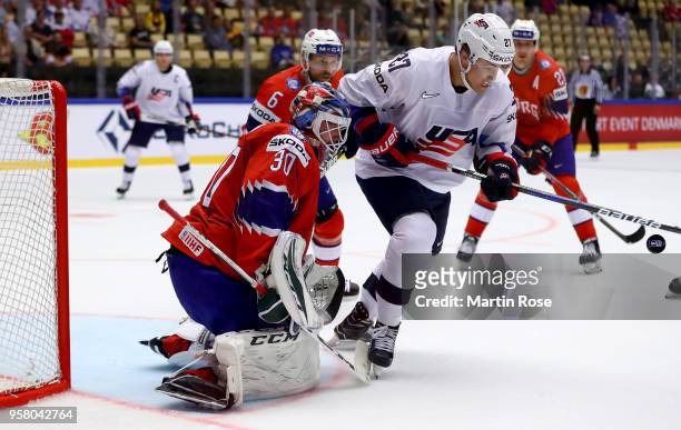 Lars Haugen,goaltender of Norway tends net against Anders Lee of United States during the 2018 IIHF Ice Hockey World Championship Group B game...