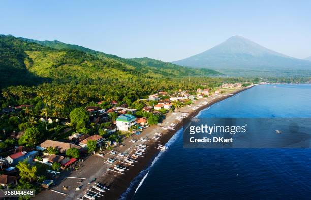 amed beach aerial view - bali volcano stock pictures, royalty-free photos & images